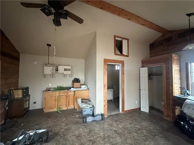 a kitchen with a sink stainless steel appliances and cabinets