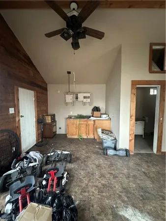 a gym room with lots of gym equipment