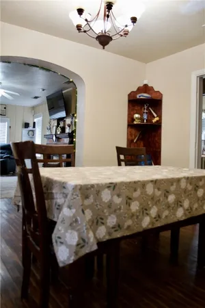 a kitchen with a table and chairs in it
