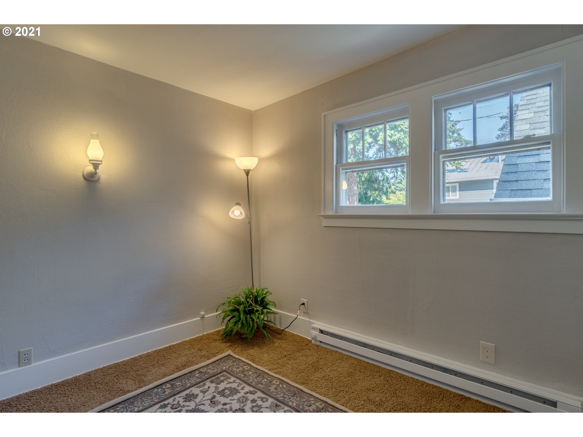 1928 Southwest 6th Avenue Camas, WA 98607 - Photo 22 of 31 an empty room with wooden floor and windows