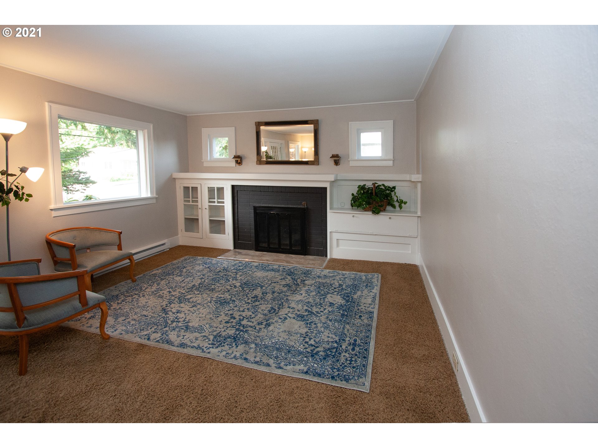 1928 Southwest 6th Avenue Camas, WA 98607 - Photo 4 of 31 a living room with furniture and a fireplace