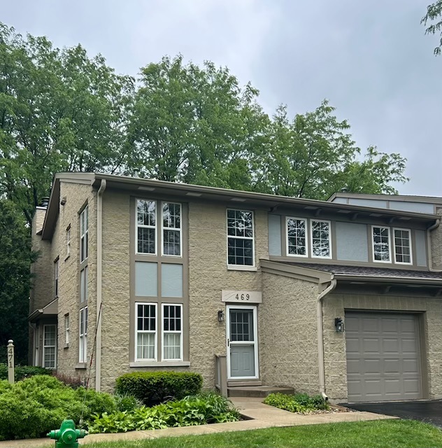469 South Jefferson Street, Unit 469 Batavia, IL 60510 - Photo 1 of 1 a front view of a house with garden