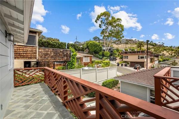 a view of balcony with furniture
