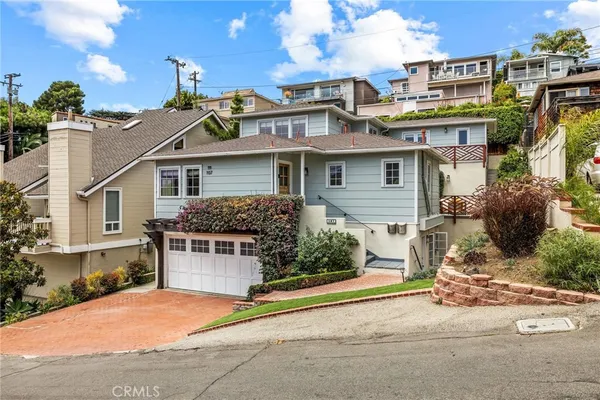 front view of a house with a street