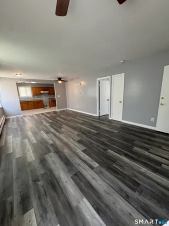 a view of an empty room and window