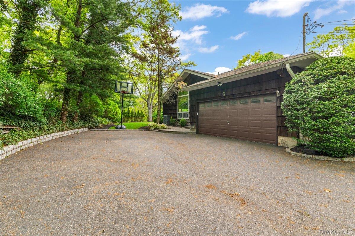 6 Apex Road Melville, NY 11747 - Photo 36 of 50 a view of a backyard
