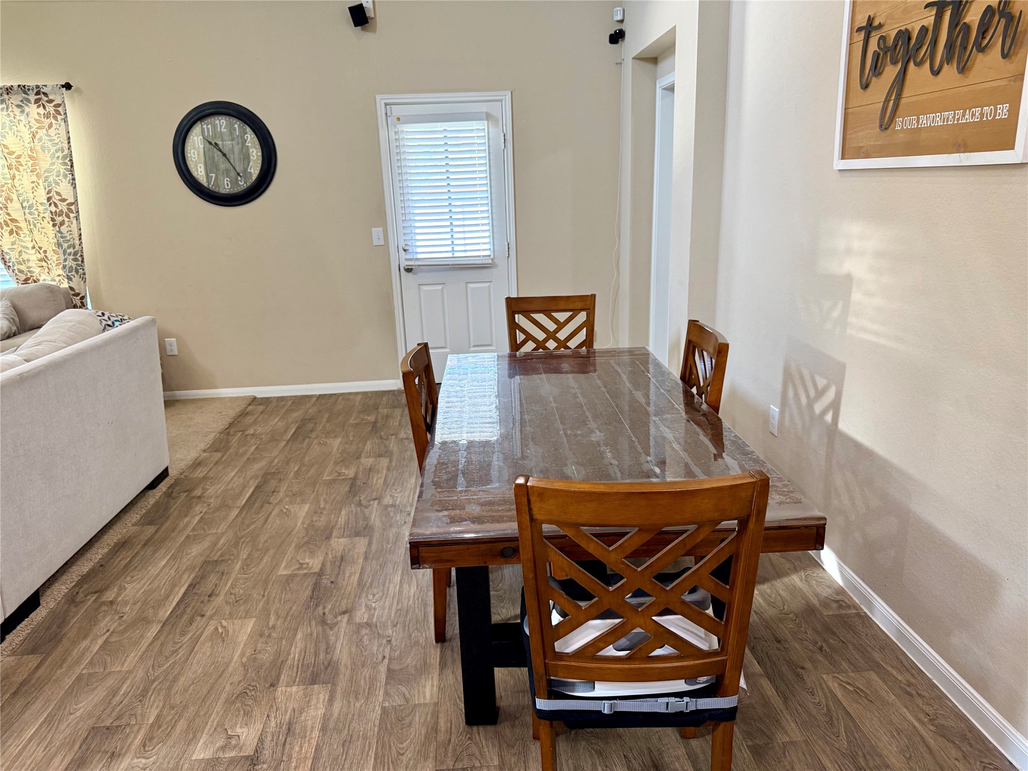 11700 Andesite Road Manor, TX 78653 - Photo 32 of 32 Functional open floorplan dining area seamlessly connecting to the living space.