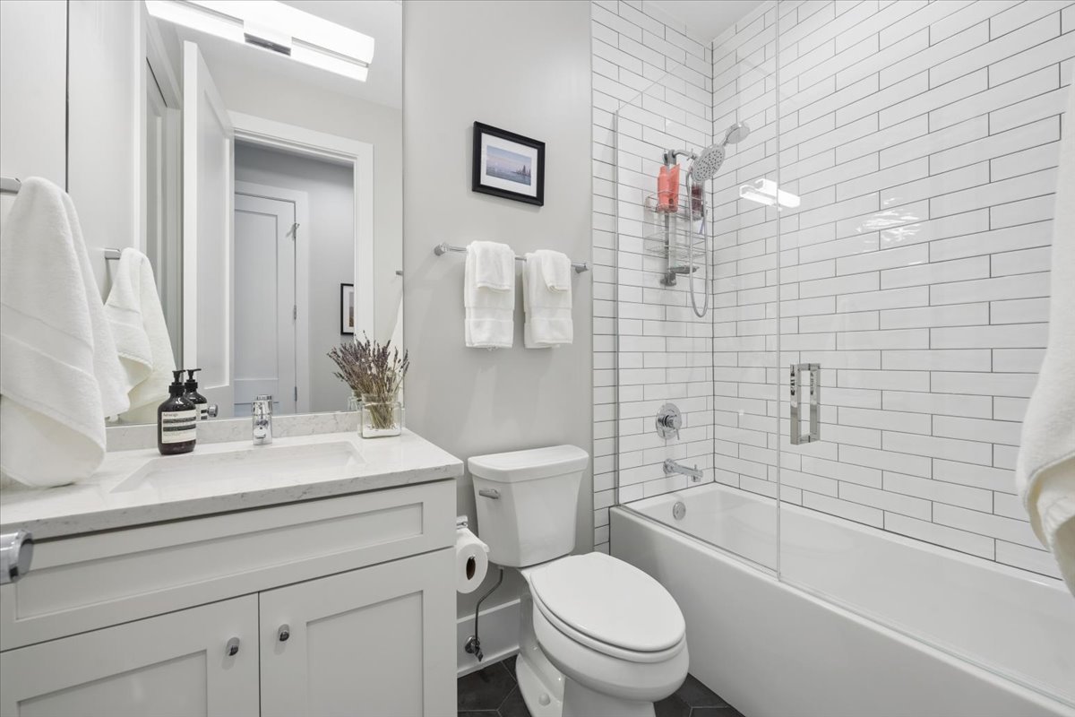 3929 North Greenview Avenue, Unit 3 Chicago, IL 60613 - Photo 20 of 35 a bathroom with a sink a toilet and shower