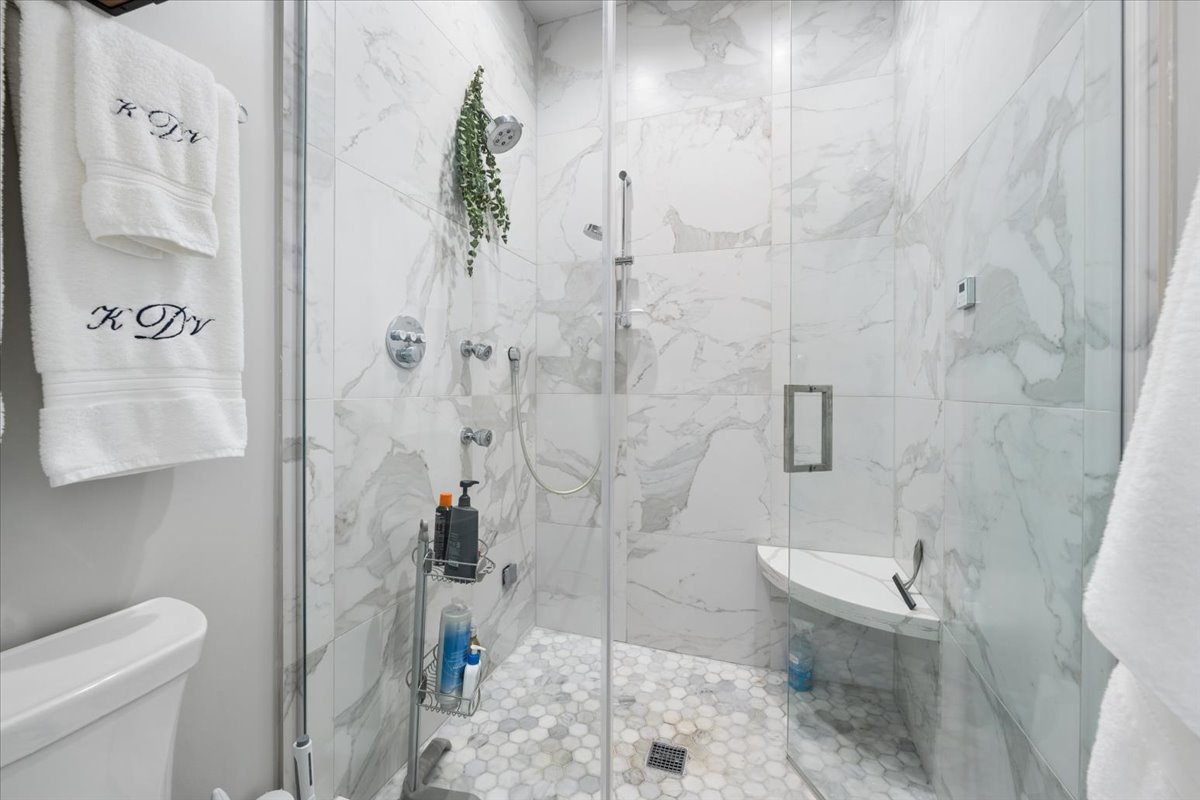 3929 North Greenview Avenue, Unit 3 Chicago, IL 60613 - Photo 25 of 35 a bathroom with a toilet and a shower