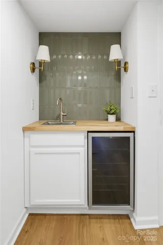 a bathroom with a sink a vanity and a mirror