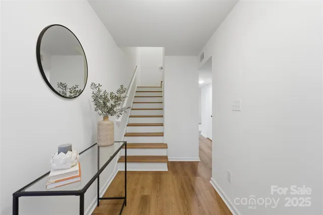 a view of a house with a street