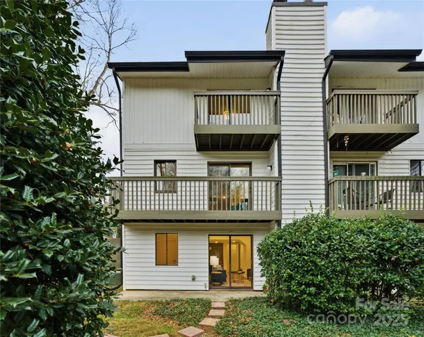 a view of backyard with garage