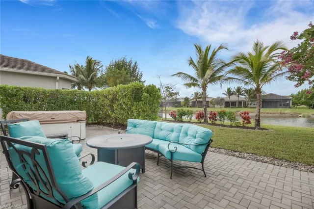 a view of a patio in the backyard