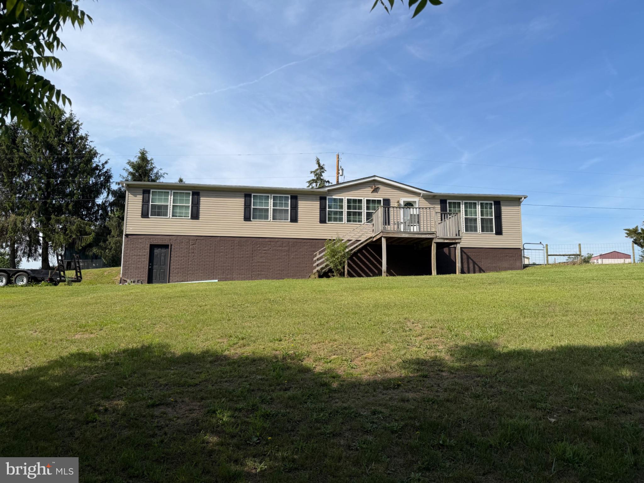 1898 Sawmill Road Hedgesville, WV 25427 - Photo 2 of 6 Charming hillside home with spacious yard.