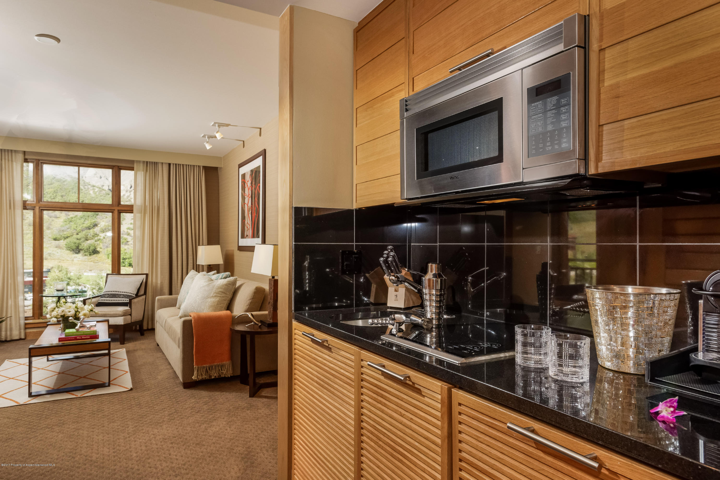 130 Wood Road, Unit 614 Snowmass Village, CO 81615 - Photo 3 of 11 a room with wine table