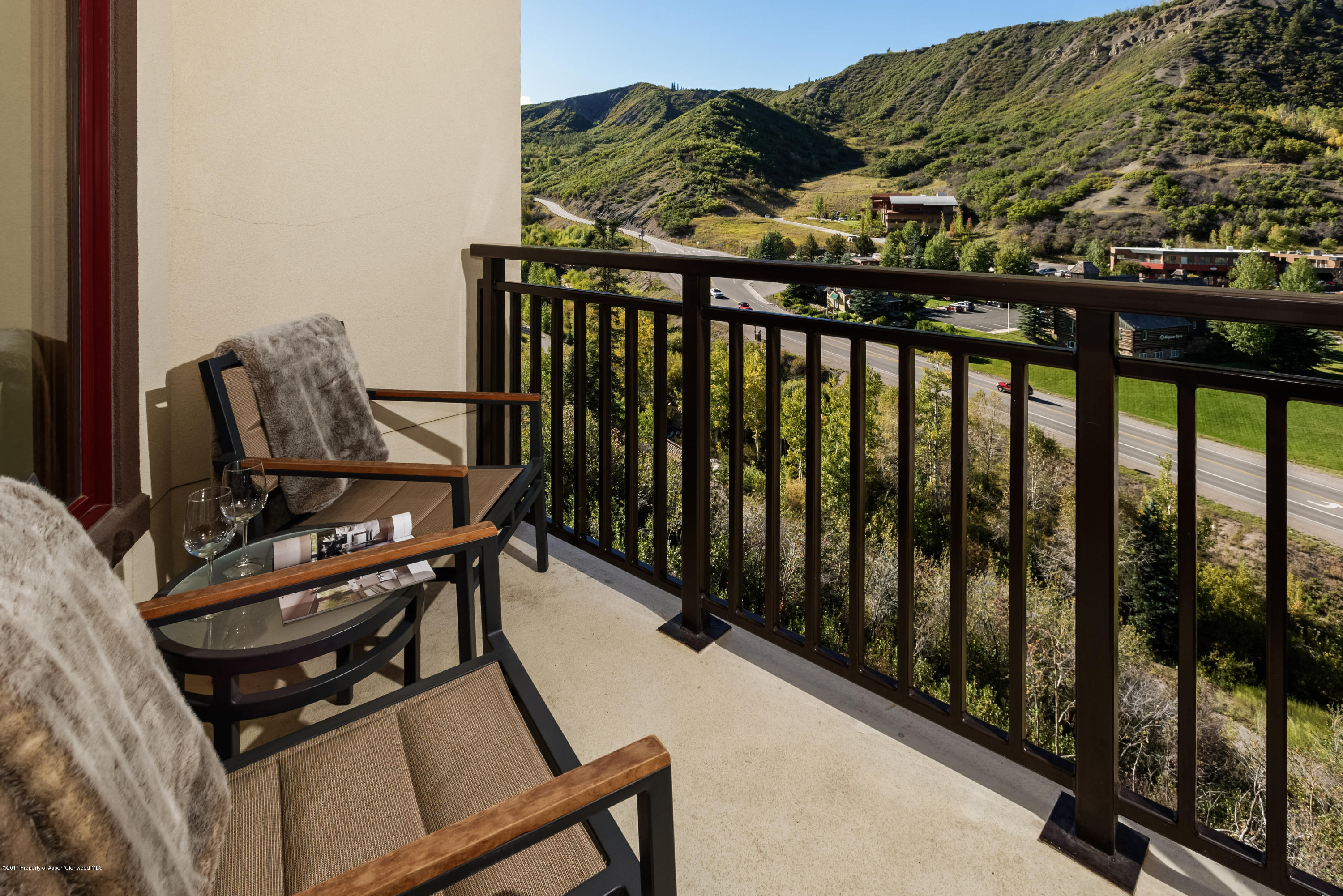 130 Wood Road, Unit 614 Snowmass Village, CO 81615 - Photo 5 of 11 a view of a balcony with chairs
