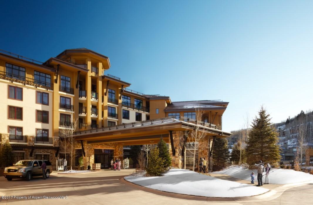 130 Wood Road, Unit 614 Snowmass Village, CO 81615 - Photo 10 of 11 a front view of a building with a street