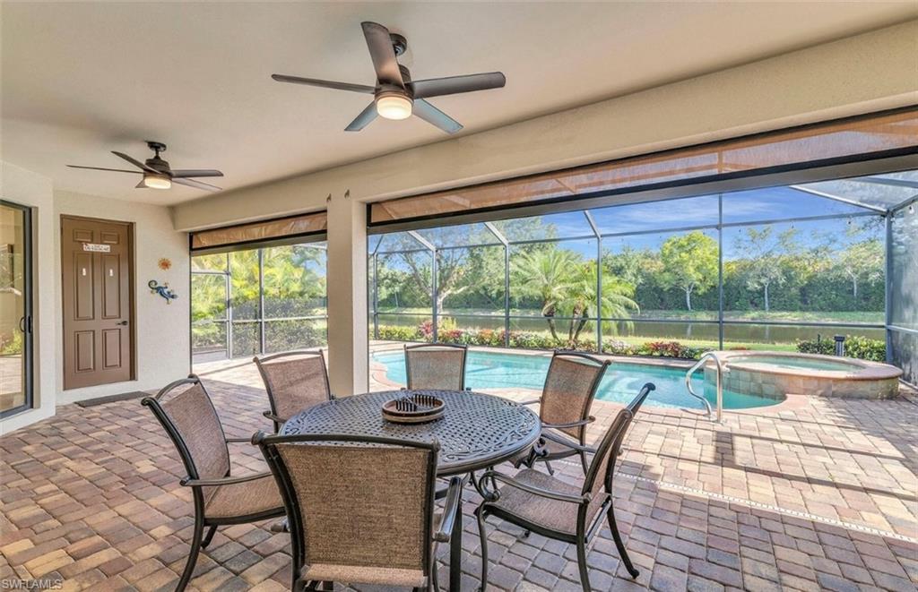 2930 Aviamar Circle Naples, FL 34114 - Photo 28 of 39 a view of a dining room with furniture window and outside view
