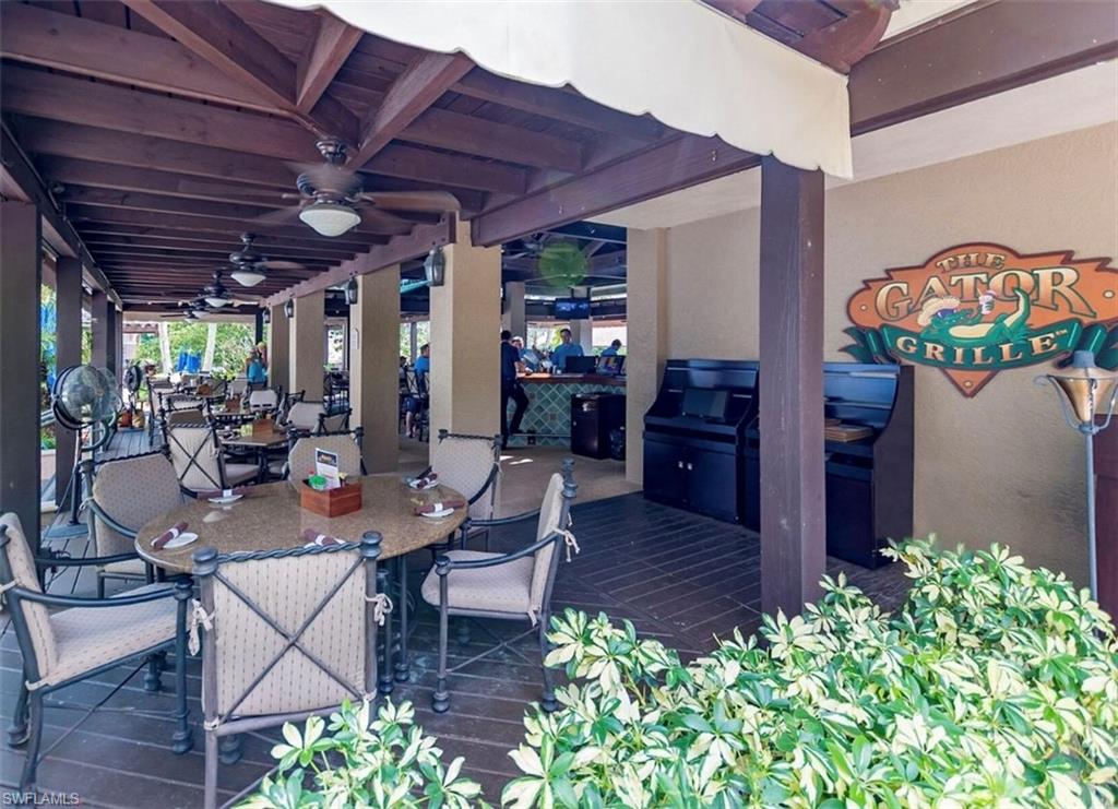2930 Aviamar Circle Naples, FL 34114 - Photo 38 of 39 a view of a table and chairs in patio
