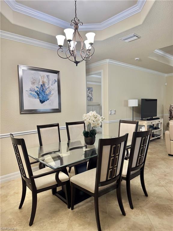 2930 Aviamar Circle Naples, FL 34114 - Photo 8 of 39 a view of a dining room with furniture