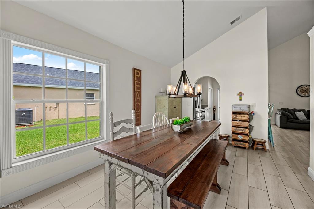 21778 Brixham Run Loop Estero, FL 33928 - Photo 15 of 48 a room with furniture pool table wooden floor and windows
