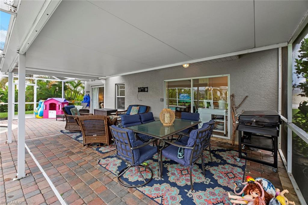 21778 Brixham Run Loop Estero, FL 33928 - Photo 27 of 48 a view of a dining room with furniture window and outside view