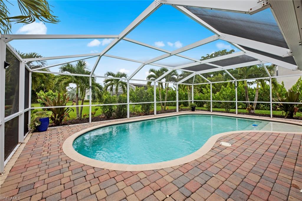 21778 Brixham Run Loop Estero, FL 33928 - Photo 29 of 48 a view of a backyard with swimming pool