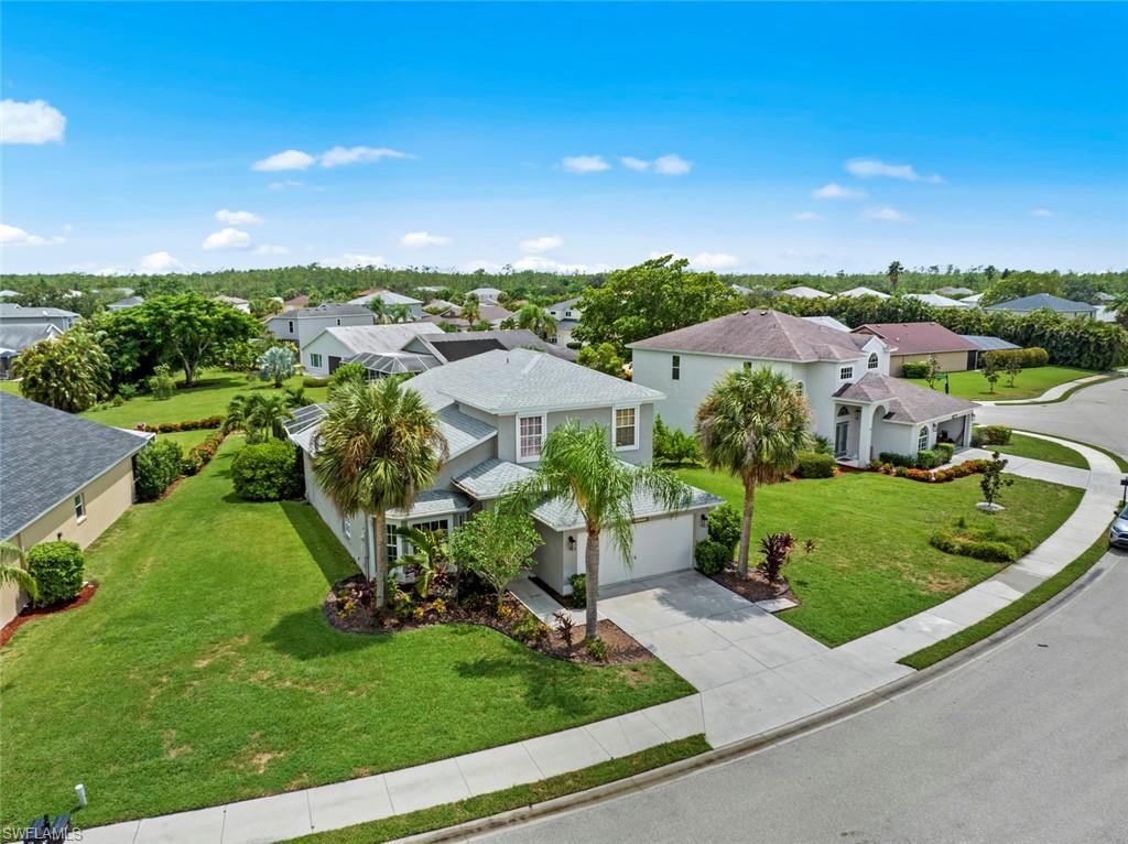 21778 Brixham Run Loop Estero, FL 33928 - Photo 34 of 48 an aerial view of a house with outdoor space and street view