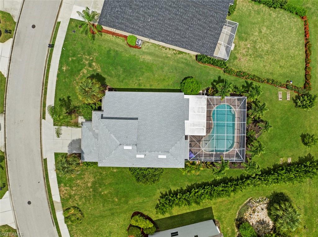 21778 Brixham Run Loop Estero, FL 33928 - Photo 43 of 48 an aerial view of a house having yard