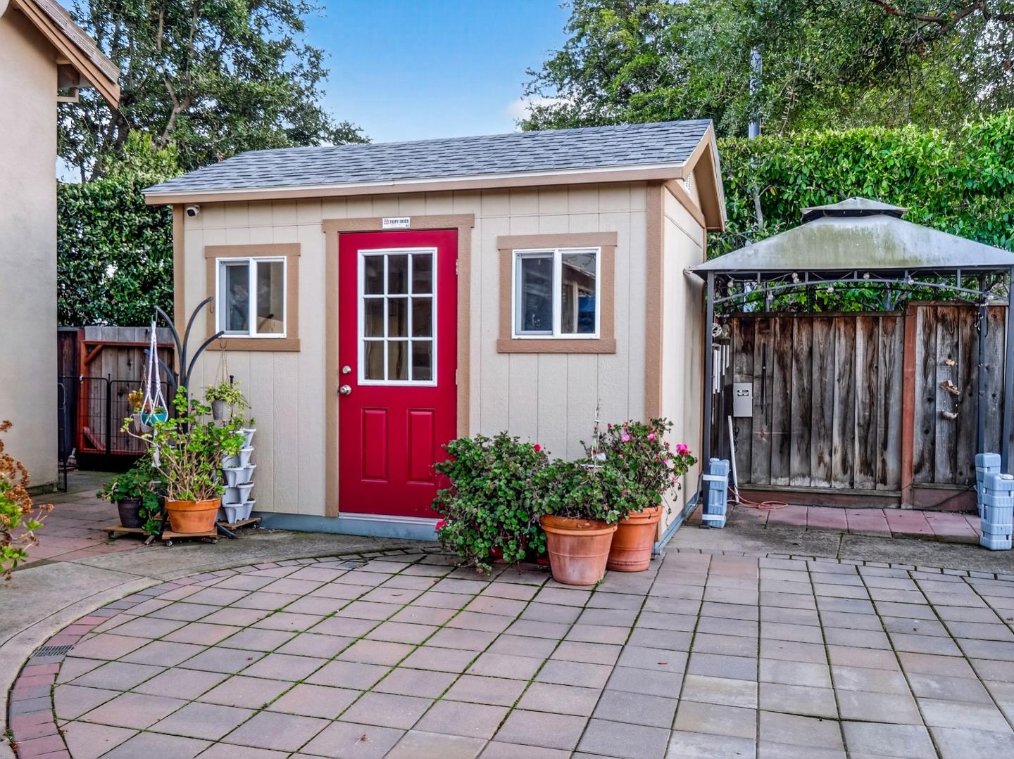9123 Rancho Hills Drive Gilroy, CA 95020 - Photo 12 of 26 a front view of a house with a yard