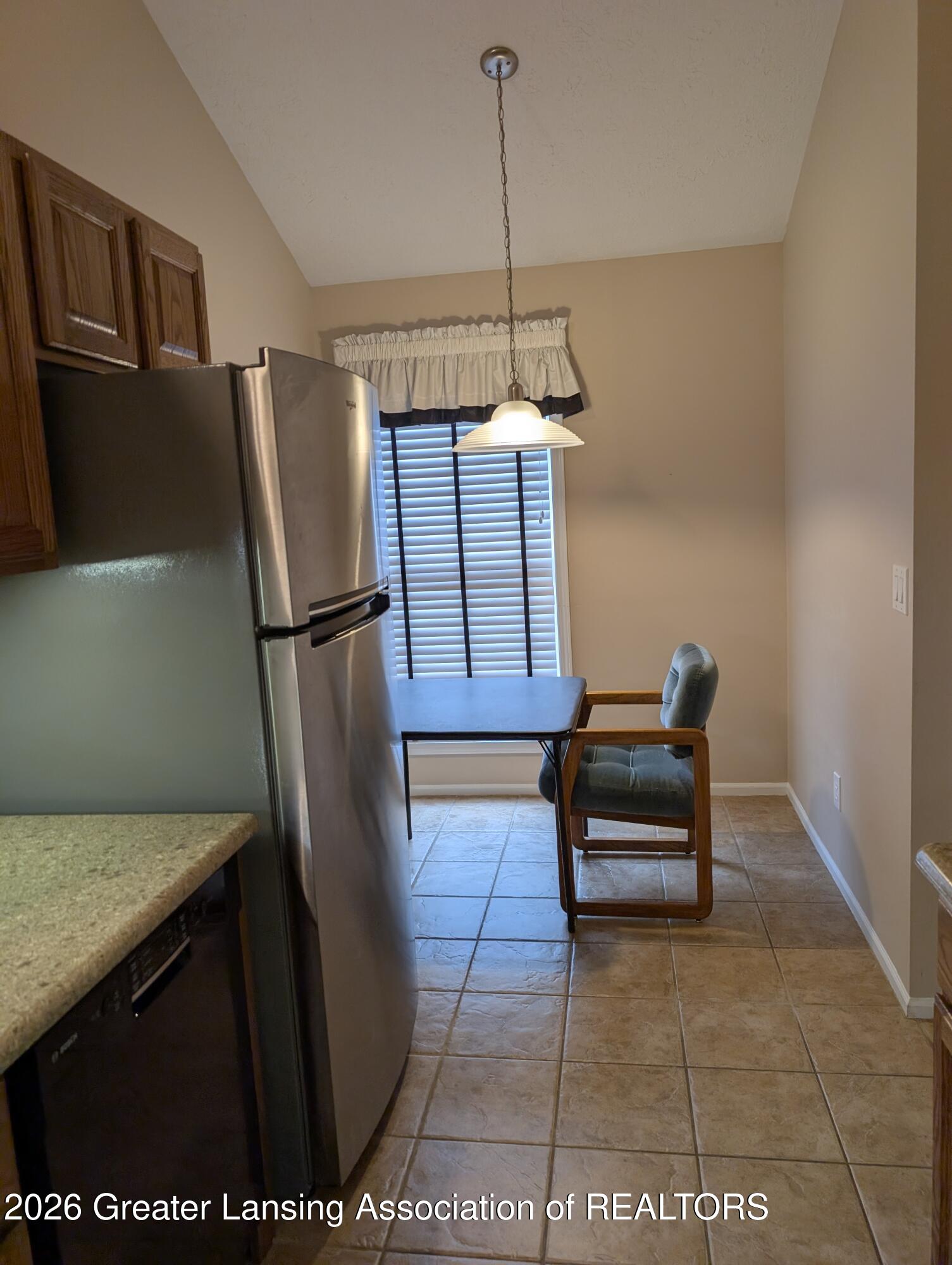2415 North Aurelius Road, Unit 14 Holt, MI 48842 - Photo 5 of 29 Kitchen with dinette