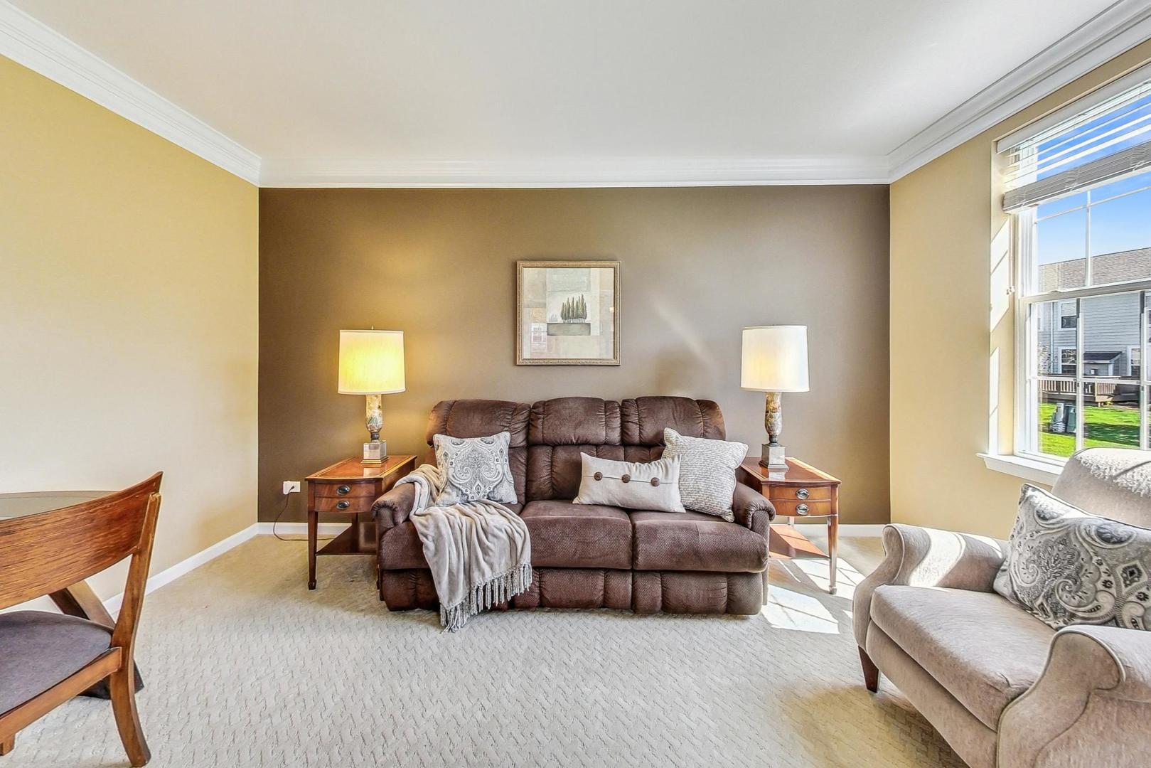 1224 Falcon Ridge Drive Elgin, IL 60124 - Photo 3 of 27 a bedroom with furniture and a large window
