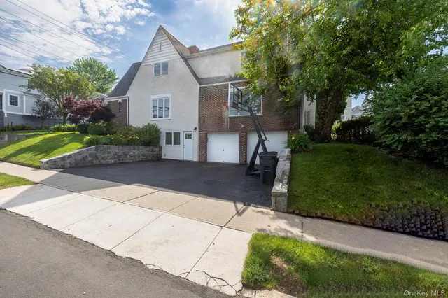 a picture of a sink and a white wall