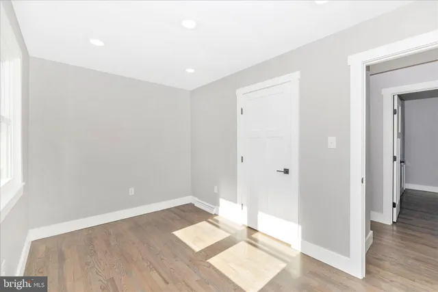 a view of a swimming pool with an outdoor space and seating area