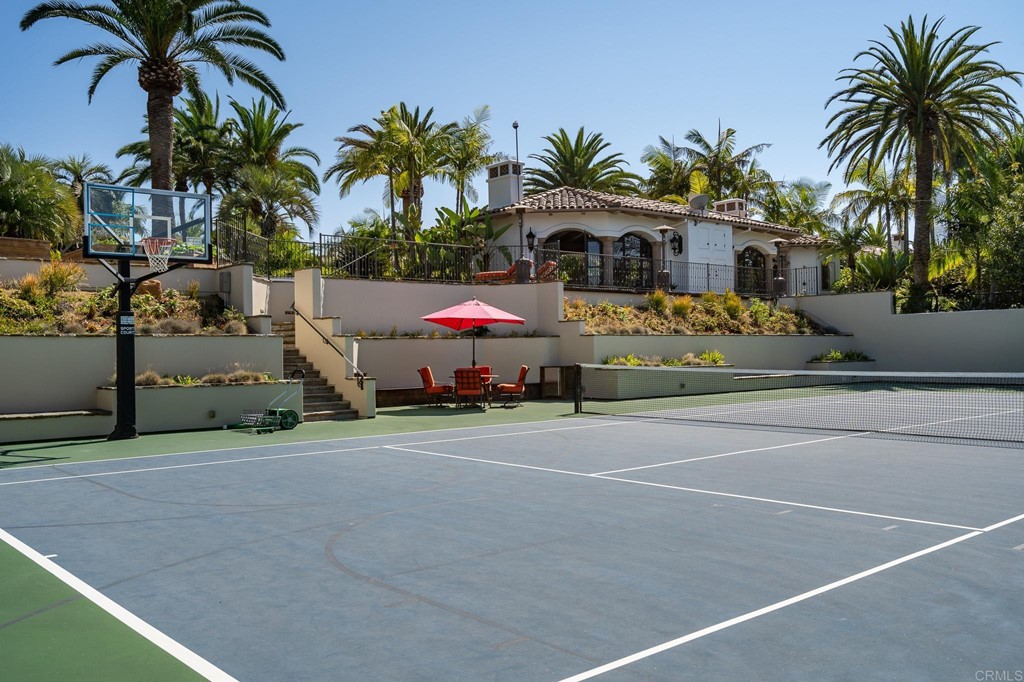 6424 La Valle Plateada Rancho Santa Fe, CA 92067 - Photo 11 of 21 a front view of house with yard and seating