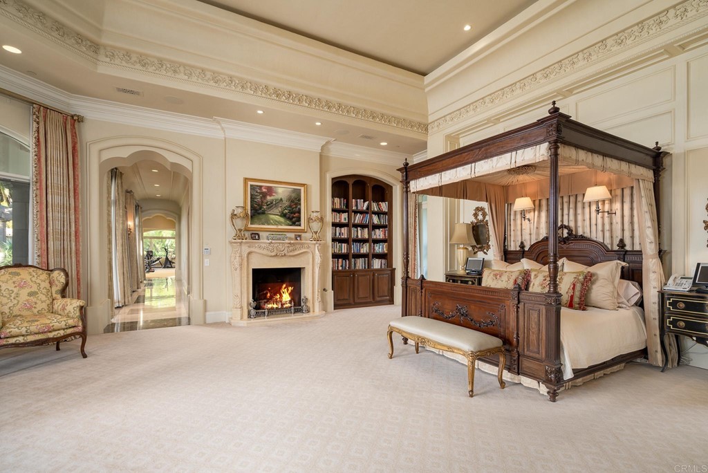6424 La Valle Plateada Rancho Santa Fe, CA 92067 - Photo 12 of 21 a living room with furniture and a fireplace