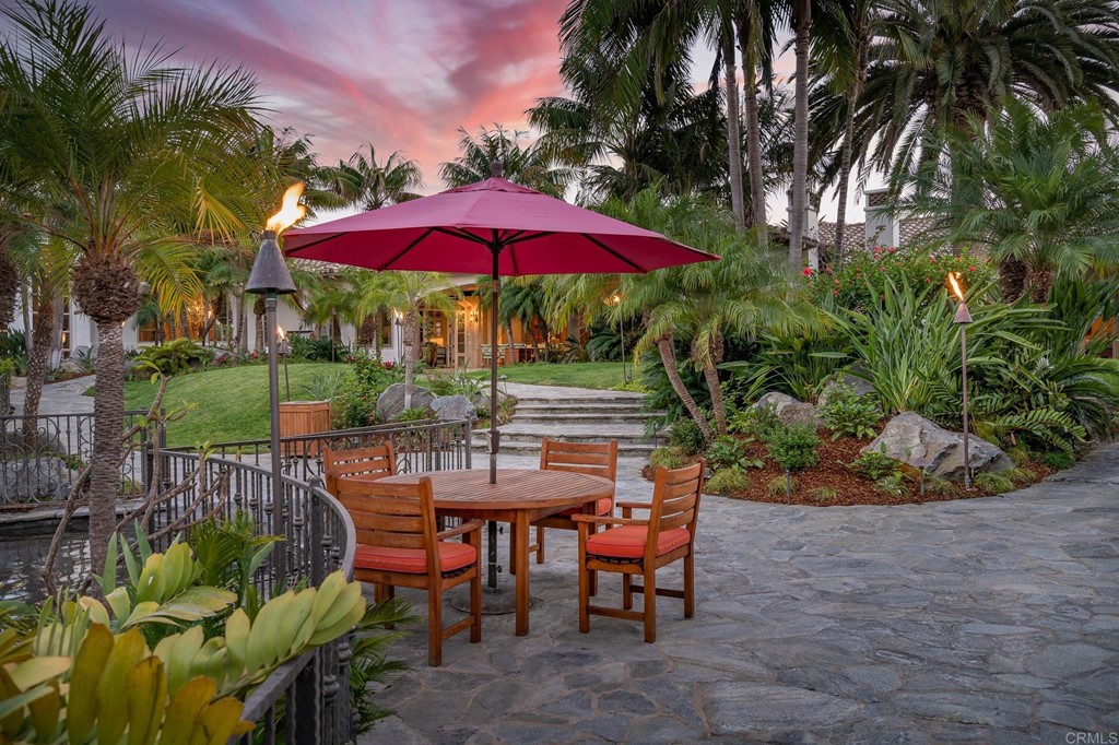 6424 La Valle Plateada Rancho Santa Fe, CA 92067 - Photo 19 of 21 a view of a backyard with sitting area and furniture