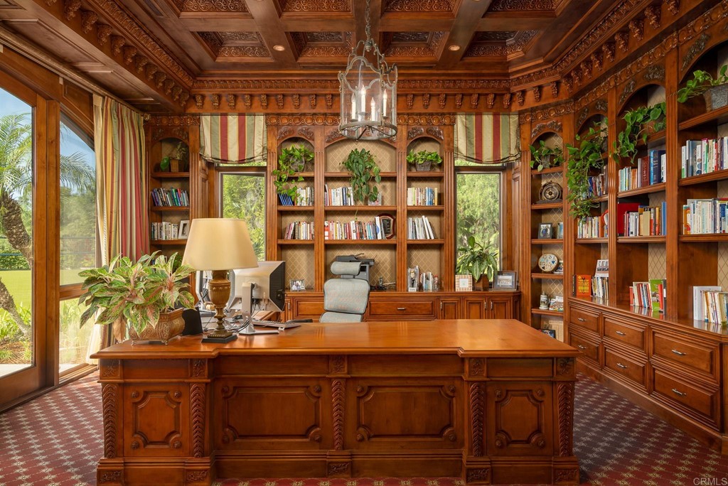 6424 La Valle Plateada Rancho Santa Fe, CA 92067 - Photo 20 of 21 a table with chairs and a potted plant