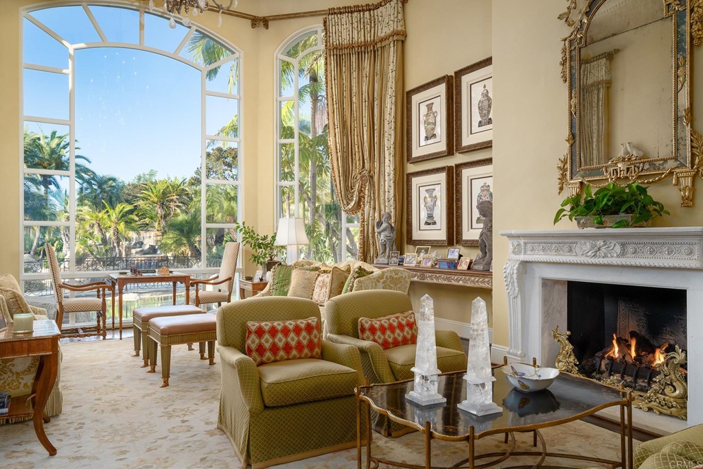 6424 La Valle Plateada Rancho Santa Fe, CA 92067 - Photo 6 of 21 a living room with furniture and a fireplace
