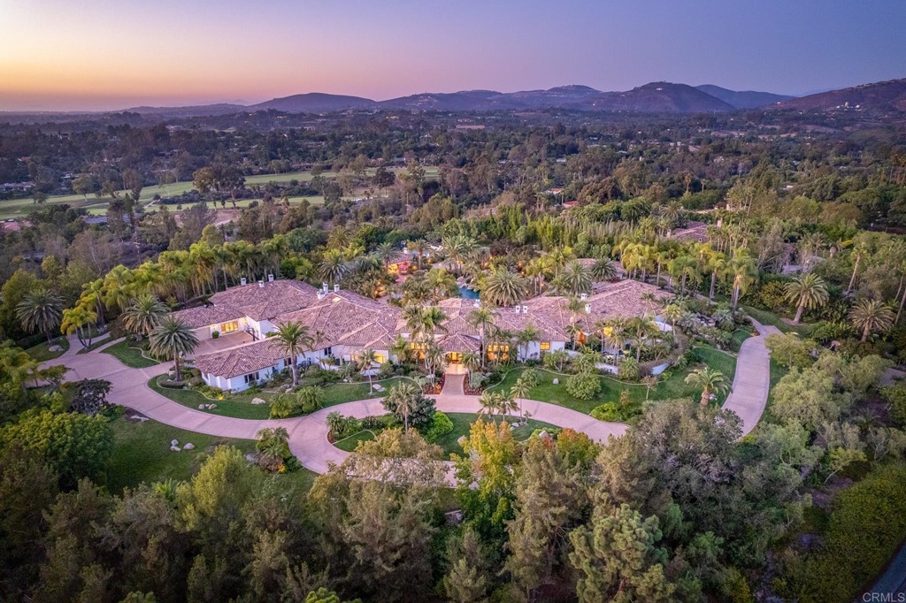 6424 La Valle Plateada Rancho Santa Fe, CA 92067 - Photo 9 of 21 an aerial view of residential houses with outdoor space and trees