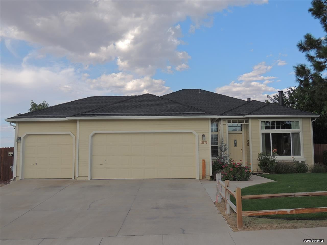 13579 Gold Run Drive Reno, NV 89521 - Photo 1 of 1 front view of house with a yard
