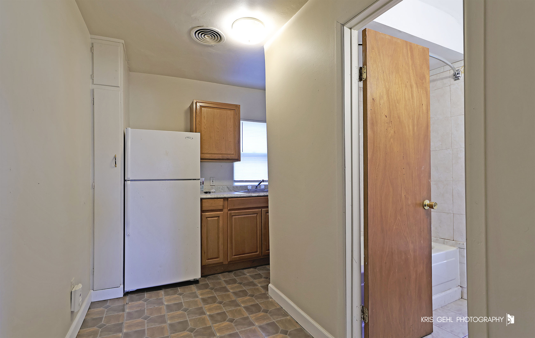 428 North Poplar Street Waukegan, IL 60085 - Photo 15 of 22 a room with storage and utility