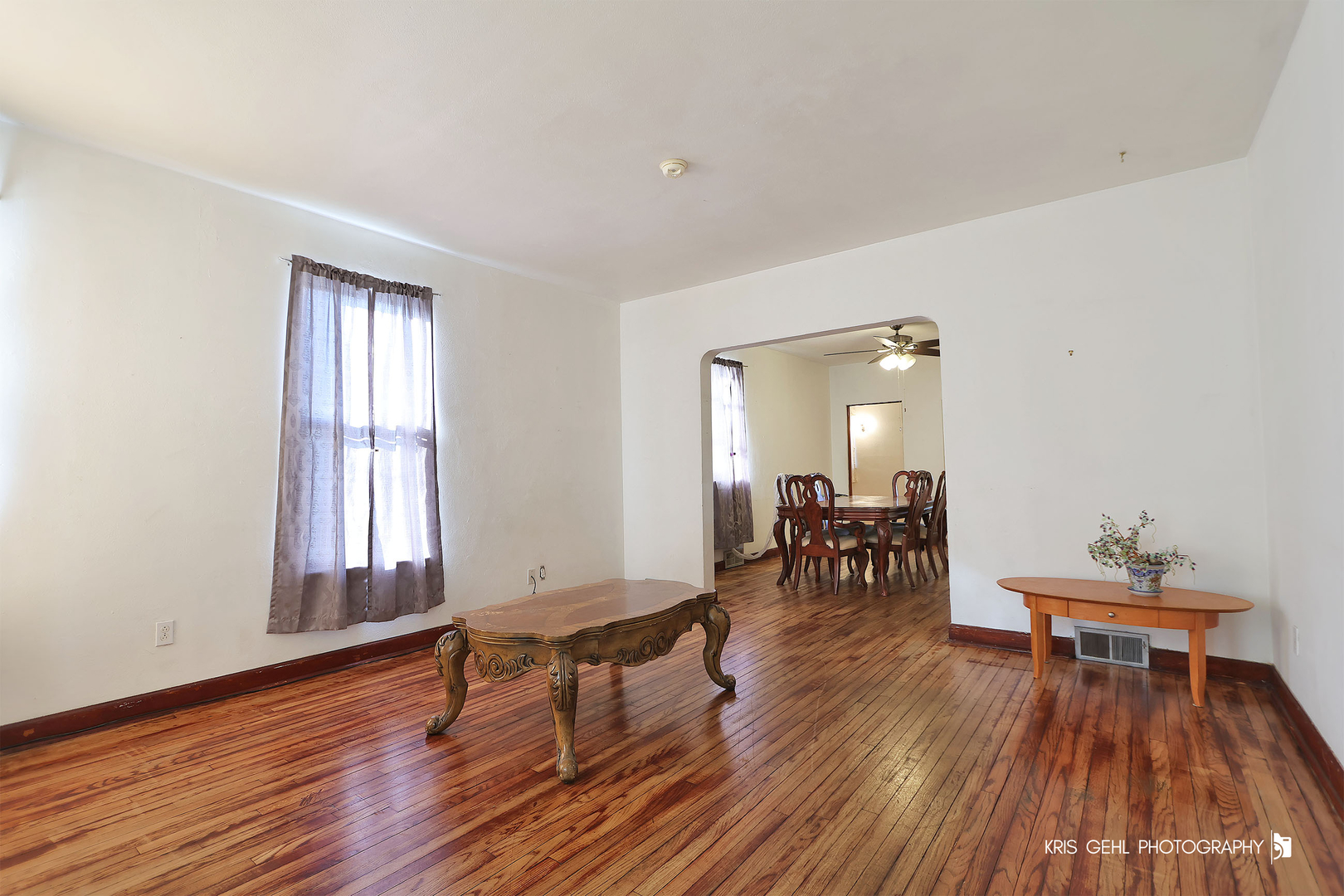428 North Poplar Street Waukegan, IL 60085 - Photo 2 of 22 a living room with furniture and a wooden floor