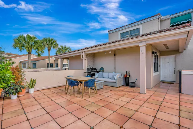 a bedroom with a bed and cabinets