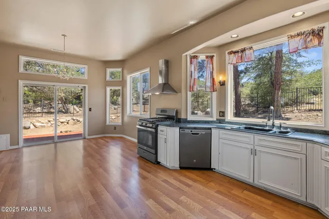 a spacious bedroom with a large bed and a couch