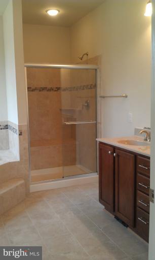 4 Elmer Derr Road Frederick, MD 21703 - Photo 22 of 26 a bathroom with a shower