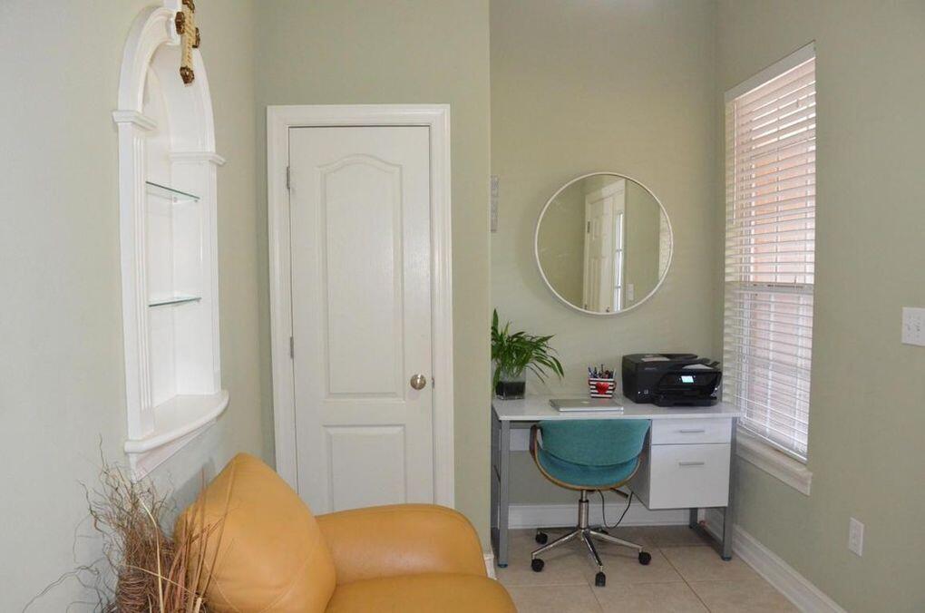 4230 Jade Loop Destin, FL 32541 - Photo 2 of 37 a living room with furniture and a window