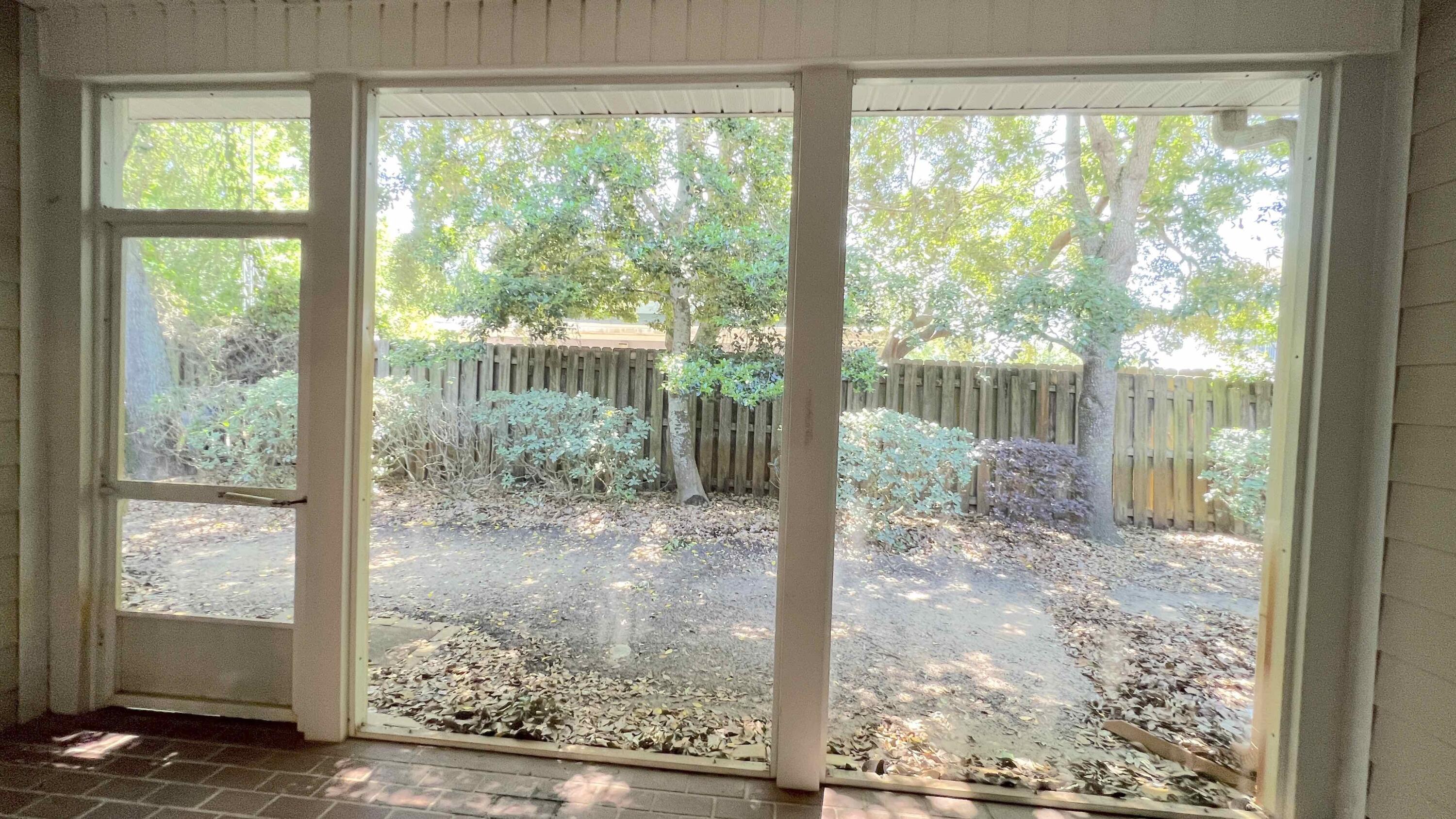 4230 Jade Loop Destin, FL 32541 - Photo 25 of 37 a view of backyard from window