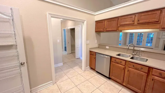 a bathroom with a sink a mirror and a shower