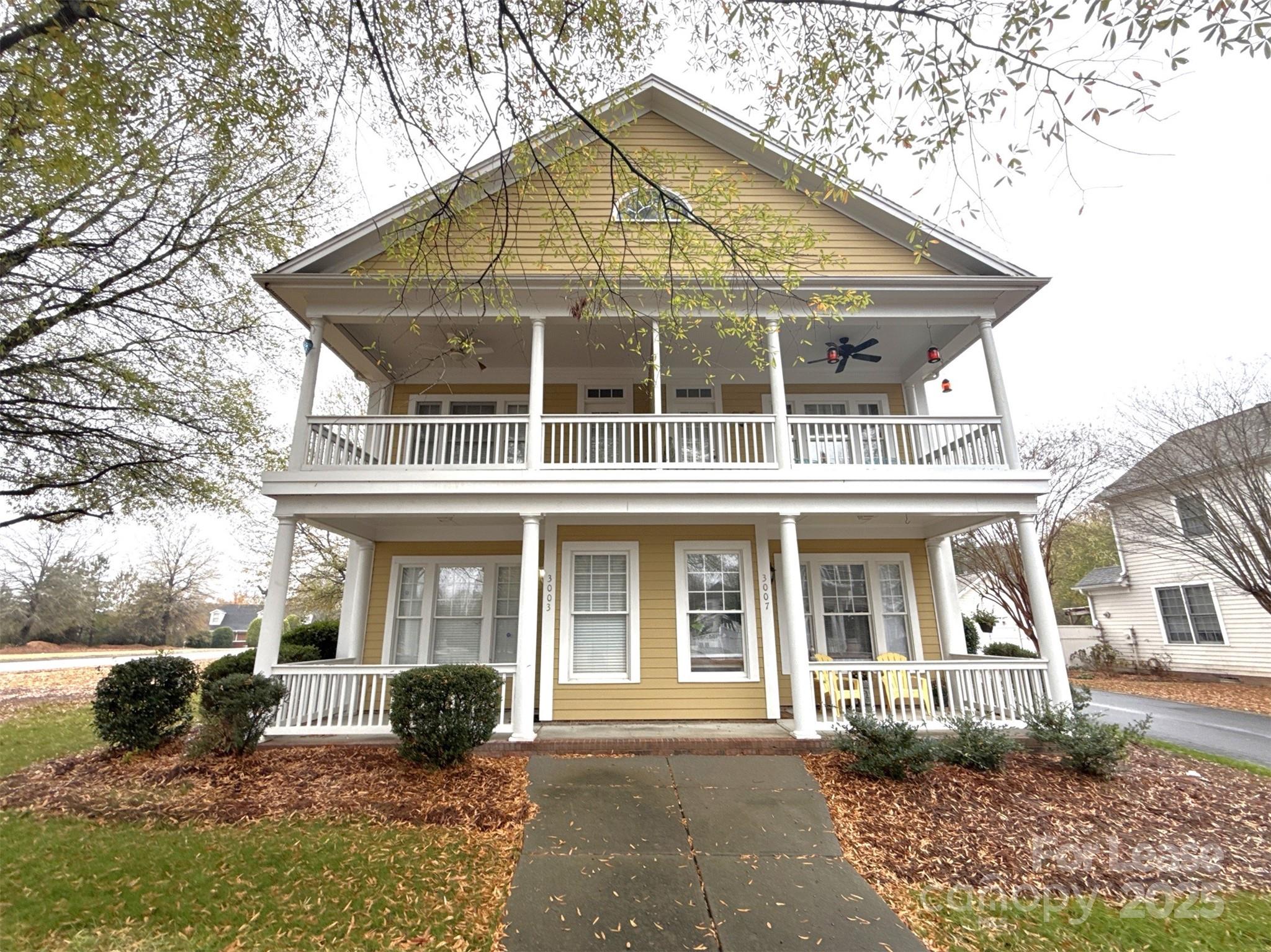 3003 Colonel Springs Way Fort Mill, SC 29708 - Photo 1 of 17 front view of a house with a yard